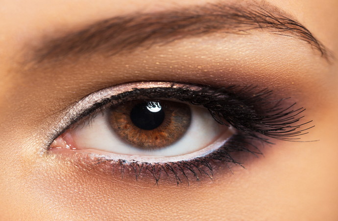 Closeup of beautiful womanish eye with glamorous makeup